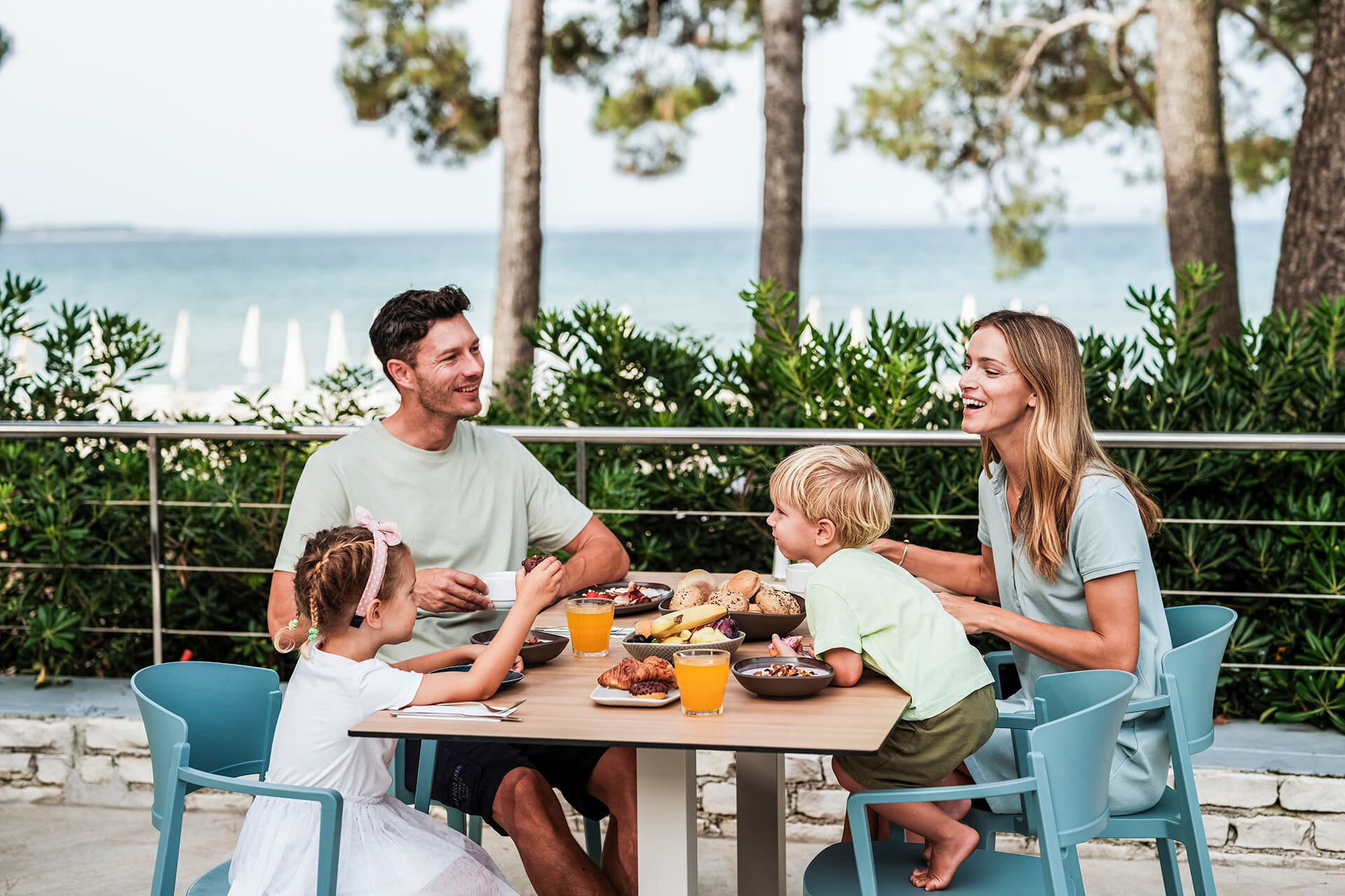 Family having breakfast on the terrace of the Mercato restaurant at Zaton Holiday Resort Zaton Holiday Resort