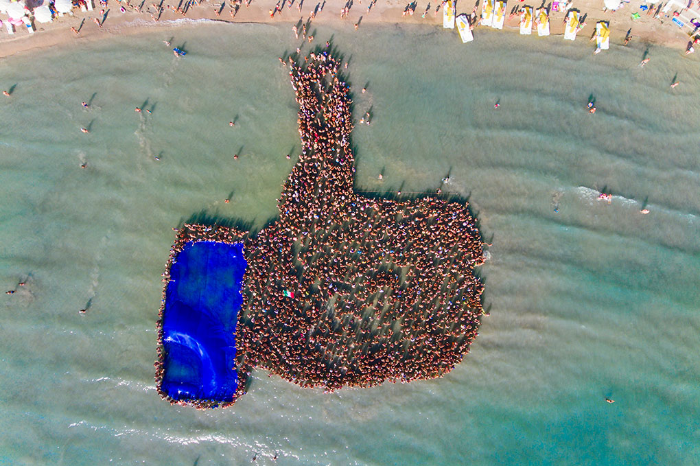 Guinness record attempt at Zaton Holiday Resort - the world’s largest human ‘like’ sign 